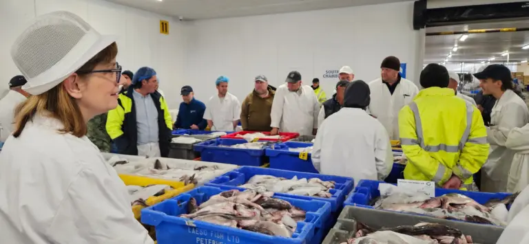 Grimsby Fish Market's shout auction in action, watched by HM Ambassador designate to Iceland, Jane Stevens.