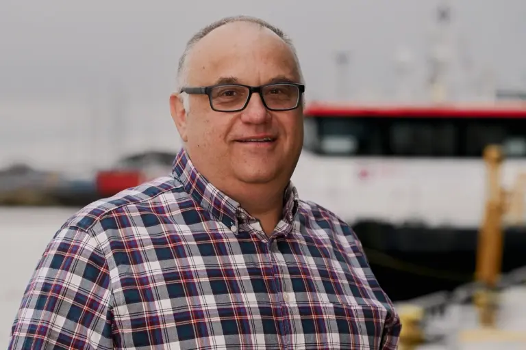Andrew Oliver, chair of Grimsby Fish Dock Enterprises Ltd, stood on the quayside at Port of Grimsby East.